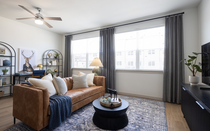 a living room with a couch and coffee table